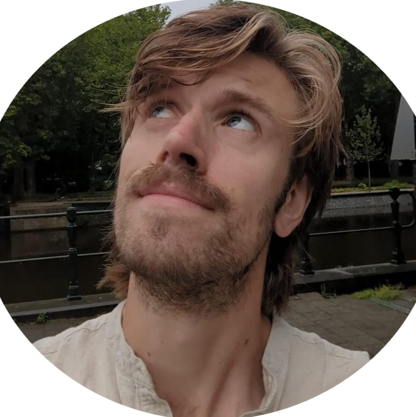 a headshot image of Peter Barker looking dreamily at what we do